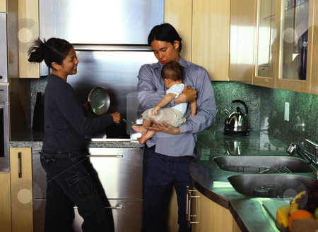 To use this stock image in your creative project, please select the size you need over to the right and click the "Add to Cart" button.
Your downloaded image will come with the Cutcaster watermark removed so don’t worry about the watermark you see on this page. MPIXIS589063 stock photo, Young family in kitchen by Mpixis World