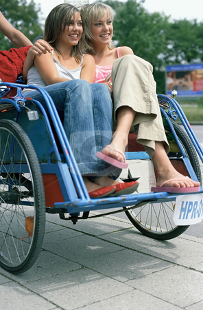 To use this stock image in your creative project, please select the size you need over to the right and click the "Add to Cart" button.
Your downloaded image will come with the Cutcaster watermark removed so don’t worry about the watermark you see on this page. MPIXIS613080 stock photo, Young women riding rickshaw by Mpixis World
