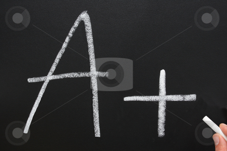 To use this stock image in your creative project, please select the size you need over to the right and click the "Add to Cart" button.
Your downloaded image will come with the Cutcaster watermark removed so don’t worry about the watermark you see on this page. A teacher writing A+ on a blackboard. stock photo, A teacher writing A+ on a blackboard. by Stephen Rees