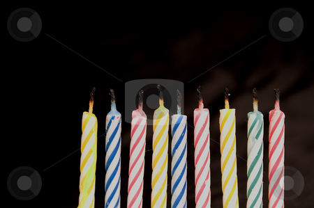 To use this stock image in your creative project, please select the size you need over to the right and click the "Add to Cart" button.
Your downloaded image will come with the Cutcaster watermark removed so don’t worry about the watermark you see on this page. Birthday Candles stock photo, Several candles typically used for birthday celebrations. by Robert Byron