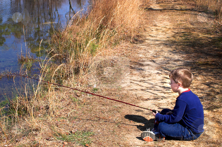 To use this stock image in your creative project, please select the size you need over to the right and click the "Add to Cart" button.
Your downloaded image will come with the Cutcaster watermark removed so don’t worry about the watermark you see on this page. Fisherman stock photo, A litlle boy fishing in a pond. by Robert Byron