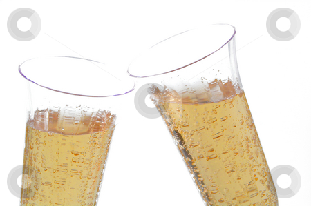 To use this stock image in your creative project, please select the size you need over to the right and click the "Add to Cart" button.
Your downloaded image will come with the Cutcaster watermark removed so don’t worry about the watermark you see on this page. Champagne stock photo, Bubbling champagne in a crystal champagne flute. by Robert Byron