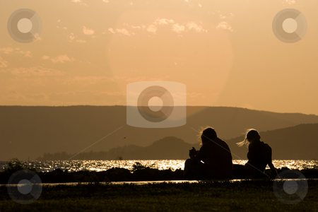 To use this stock image in your creative project, please select the size you need over to the right and click the "Add to Cart" button.
Your downloaded image will come with the Cutcaster watermark removed so don’t worry about the watermark you see on this page. Couple at sunset stock photo, by Fesus Robert