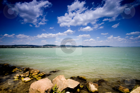 To use this stock image in your creative project, please select the size you need over to the right and click the "Add to Cart" button.
Your downloaded image will come with the Cutcaster watermark removed so don’t worry about the watermark you see on this page. Lake Balaton, Hungary stock photo, Lake Balaton, Hungary by Fesus Robert