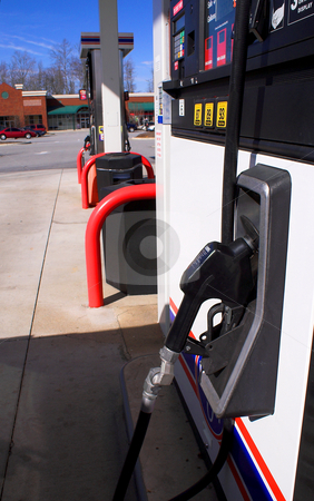 To use this stock image in your creative project, please select the size you need over to the right and click the "Add to Cart" button.
Your downloaded image will come with the Cutcaster watermark removed so don’t worry about the watermark you see on this page. Gas Pumps stock photo, A line of gas pumps at a srvice station. by Robert Byron