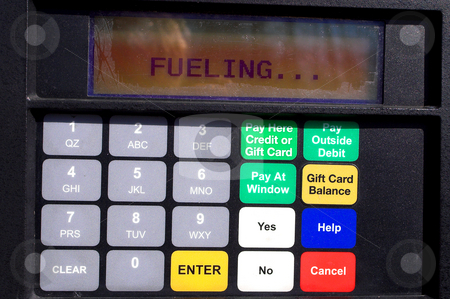 To use this stock image in your creative project, please select the size you need over to the right and click the "Add to Cart" button.
Your downloaded image will come with the Cutcaster watermark removed so don’t worry about the watermark you see on this page. Gas Pump Display stock photo, The display on a gas pump at a service station. by Robert Byron