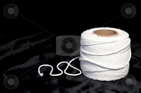 To use this stock image in your creative project, please select the size you need over to the right and click the "Add to Cart" button.
Your downloaded image will come with the Cutcaster watermark removed so don’t worry about the watermark you see on this page. String stock photo, String wound on a spool of cardboard. by Robert Byron