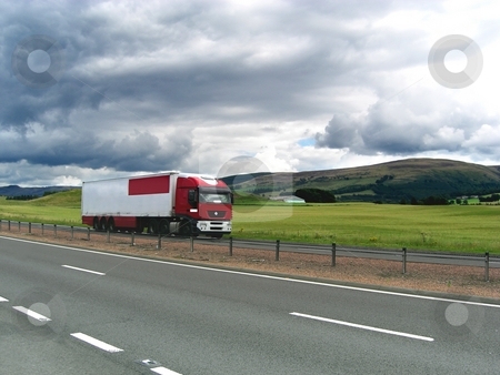 To use this stock image in your creative project, please select the size you need over to the right and click the "Add to Cart" button.
Your downloaded image will come with the Cutcaster watermark removed so don’t worry about the watermark you see on this page. Lorry on the road stock photo, Lorry on the road by Juliet Photography