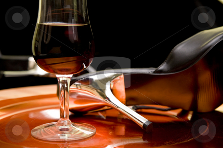 To use this stock image in your creative project, please select the size you need over to the right and click the "Add to Cart" button.
Your downloaded image will come with the Cutcaster watermark removed so don’t worry about the watermark you see on this page. Red wine and high heels on a tray stock photo, Closeup of a glass of red wine and high heel shoes on an orange tray. by Magdalena Ascough
