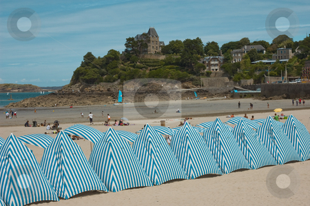 To use this stock image in your creative project, please select the size you need over to the right and click the "Add to Cart" button.
Your downloaded image will come with the Cutcaster watermark removed so don’t worry about the watermark you see on this page. ON THE BEACH stock photo, On the beach in Dinard France. by Elf Evans
