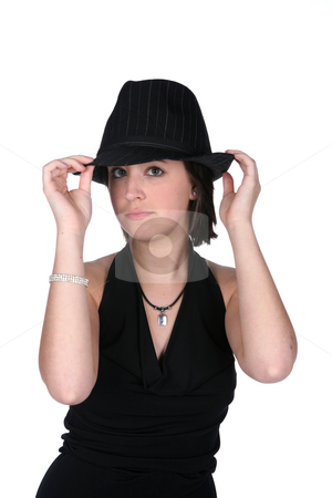 To use this stock image in your creative project, please select the size you need over to the right and click the "Add to Cart" button.
Your downloaded image will come with the Cutcaster watermark removed so don’t worry about the watermark you see on this page. Old style gangster looking teen with black hat and dress stock photo, Old style gangster looking teenage girl wearing black dress and top hat by Sue and Shawn Roberts