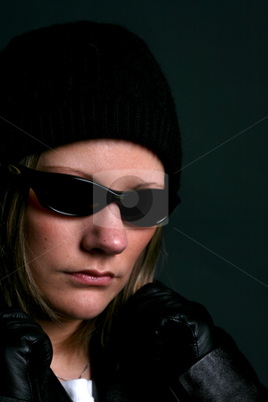 To use this stock image in your creative project, please select the size you need over to the right and click the "Add to Cart" button.
Your downloaded image will come with the Cutcaster watermark removed so don’t worry about the watermark you see on this page. Woman in dark sunglasses stock photo, Attractive woman in dark sunglasses and black clothes. by Sue and Shawn Roberts