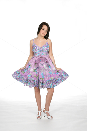 To use this stock image in your creative project, please select the size you need over to the right and click the "Add to Cart" button.
Your downloaded image will come with the Cutcaster watermark removed so don’t worry about the watermark you see on this page. Sundress teen stock photo, Teenage girl in pretty sundress by Sue and Shawn Roberts