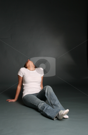 To use this stock image in your creative project, please select the size you need over to the right and click the "Add to Cart" button.
Your downloaded image will come with the Cutcaster watermark removed so don’t worry about the watermark you see on this page. Woman sitting with her head thrown back stock photo, Attractive woman sitting with her head thrown back. by Sue and Shawn Roberts