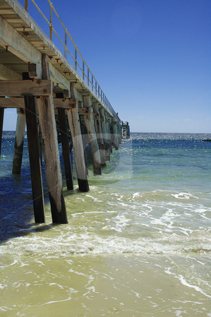 To use this stock image in your creative project, please select the size you need over to the right and click the "Add to Cart" button.
Your downloaded image will come with the Cutcaster watermark removed so don’t worry about the watermark you see on this page. The Jetty stock photo, Port Rickaby jetty in South Australia by Irene Scales
