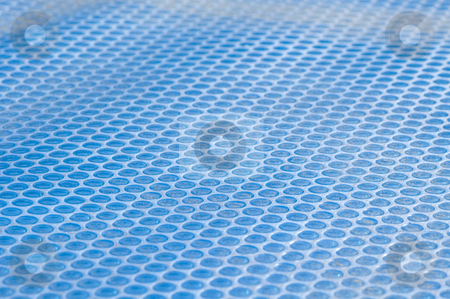 To use this stock image in your creative project, please select the size you need over to the right and click the "Add to Cart" button.
Your downloaded image will come with the Cutcaster watermark removed so don’t worry about the watermark you see on this page. Pool cover stock photo, Solar Pool Cover, bubble texture, blue by Irene Scales