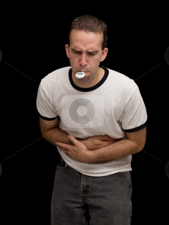 To use this stock image in your creative project, please select the size you need over to the right and click the "Add to Cart" button.
Your downloaded image will come with the Cutcaster watermark removed so don’t worry about the watermark you see on this page. Cramps stock photo, A male holding his stomach in pain and taking his temperature by Richard Nelson
