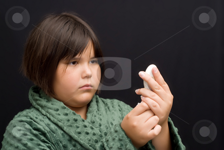 To use this stock image in your creative project, please select the size you need over to the right and click the "Add to Cart" button.
Your downloaded image will come with the Cutcaster watermark removed so don’t worry about the watermark you see on this page. Fever stock photo, A young girl reading the thermometer to see if she has a fever by Richard Nelson