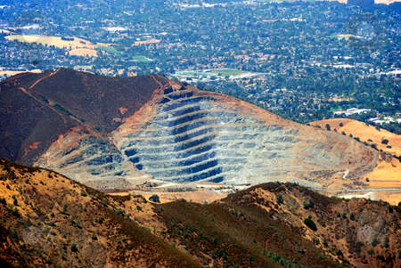 To use this stock image in your creative project, please select the size you need over to the right and click the "Add to Cart" button.
Your downloaded image will come with the Cutcaster watermark removed so don’t worry about the watermark you see on this page. Rock Quarry stock photo, Rock Quarry at Mt. Zion, California as seen from Mt. Diablo by Denis Radovanovic