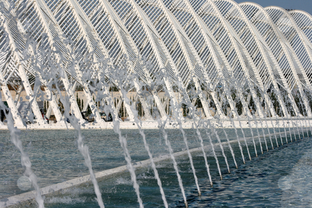 To use this stock image in your creative project, please select the size you need over to the right and click the "Add to Cart" button.
Your downloaded image will come with the Cutcaster watermark removed so don’t worry about the watermark you see on this page. Fountains stock photo, Fountains at water lake background detail from modern metallic stucture of agora olympic stadium athens greece by EVANGELOS THOMAIDIS