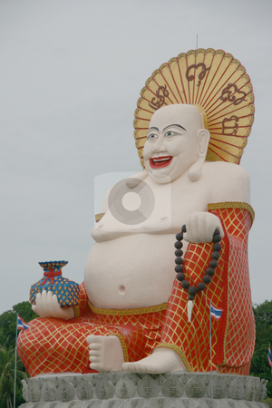 To use this stock image in your creative project, please select the size you need over to the right and click the "Add to Cart" button.
Your downloaded image will come with the Cutcaster watermark removed so don’t worry about the watermark you see on this page. Smiling buddha of wealth stock photo, Smiling buddha of wealth statue at Wat Pai Laem temple in samui island thailand by EVANGELOS THOMAIDIS