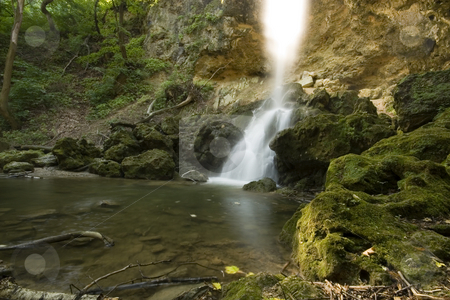 To use this stock image in your creative project, please select the size you need over to the right and click the "Add to Cart" button.
Your downloaded image will come with the Cutcaster watermark removed so don’t worry about the watermark you see on this page. The beautiful waterfall in forest, long exposure stock photo, The beautiful waterfall in forest, long exposure by Fesus Robert