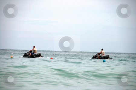To use this stock image in your creative project, please select the size you need over to the right and click the "Add to Cart" button.
Your downloaded image will come with the Cutcaster watermark removed so don’t worry about the watermark you see on this page. Water jet sky stock photo, Water jet sky summer sports in samui island thailand by EVANGELOS THOMAIDIS
