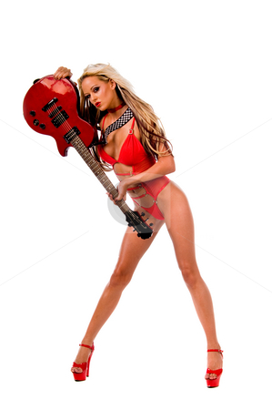 To use this stock image in your creative project, please select the size you need over to the right and click the "Add to Cart" button.
Your downloaded image will come with the Cutcaster watermark removed so don’t worry about the watermark you see on this page. Rock N Roll girl in red lingerie stock photo, Blonde lingerie model in a red one piece and red high heels with a red Les Paul style electric guitar by Robert Deal