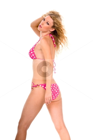 To use this stock image in your creative project, please select the size you need over to the right and click the "Add to Cart" button.
Your downloaded image will come with the Cutcaster watermark removed so don’t worry about the watermark you see on this page. Blond woman in pink bikini. stock photo, Back view of a blond woman wearing a pink polka dot bikini. by Robert Deal