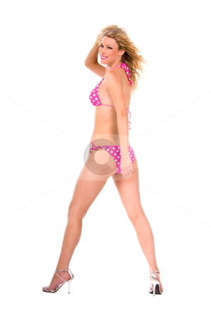 To use this stock image in your creative project, please select the size you need over to the right and click the "Add to Cart" button.
Your downloaded image will come with the Cutcaster watermark removed so don’t worry about the watermark you see on this page. Blond woman in pink bikini. stock photo, Full length shot of a smiling blond woman wearing a pink polka dot bikini. by Robert Deal