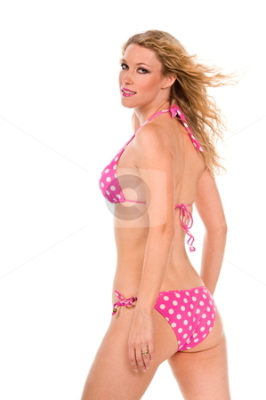 To use this stock image in your creative project, please select the size you need over to the right and click the "Add to Cart" button.
Your downloaded image will come with the Cutcaster watermark removed so don’t worry about the watermark you see on this page. Pink polka dot bikini. stock photo, Back view of a blond woman wearing a pink polka dot bikini. by Robert Deal