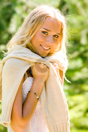 To use this stock image in your creative project, please select the size you need over to the right and click the "Add to Cart" button.
Your downloaded image will come with the Cutcaster watermark removed so don’t worry about the watermark you see on this page. Lovely young woman stock photo, Portrait of lovely young woman outdoors by Vitaly Sokolovskiy
