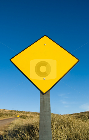 To use this stock image in your creative project, please select the size you need over to the right and click the "Add to Cart" button.
Your downloaded image will come with the Cutcaster watermark removed so don’t worry about the watermark you see on this page. Blank yellow traffic sign. stock photo, Blank yellow traffic sign in a road in Patagonia. by Pablo Caridad