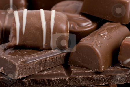 To use this stock image in your creative project, please select the size you need over to the right and click the "Add to Cart" button.
Your downloaded image will come with the Cutcaster watermark removed so don’t worry about the watermark you see on this page. Chocolate-Coffee background stock photo, Chocolate-Coffee background by Fesus Robert