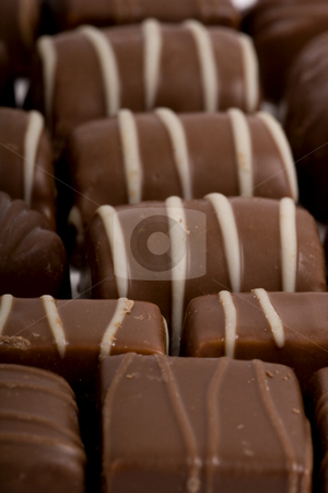 To use this stock image in your creative project, please select the size you need over to the right and click the "Add to Cart" button.
Your downloaded image will come with the Cutcaster watermark removed so don’t worry about the watermark you see on this page. Chocolate-Coffee background stock photo, Chocolate-Coffee background by Fesus Robert