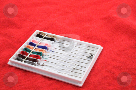 To use this stock image in your creative project, please select the size you need over to the right and click the "Add to Cart" button.
Your downloaded image will come with the Cutcaster watermark removed so don’t worry about the watermark you see on this page. Sewing Kit on red background stock photo, A small portable travel sized sewing kit. by Robert Byron
