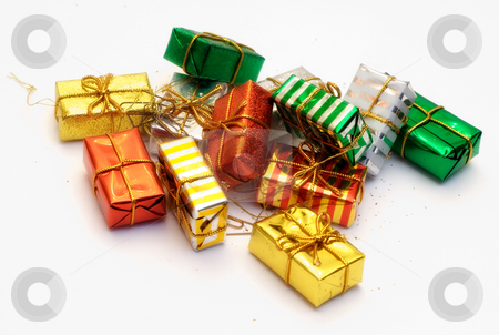 To use this stock image in your creative project, please select the size you need over to the right and click the "Add to Cart" button.
Your downloaded image will come with the Cutcaster watermark removed so don’t worry about the watermark you see on this page. Assorted Gifts stock photo, A pile of presents isolated on a white background by Richard Nelson