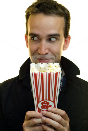 To use this stock image in your creative project, please select the size you need over to the right and click the "Add to Cart" button.
Your downloaded image will come with the Cutcaster watermark removed so don’t worry about the watermark you see on this page. Snack Time stock photo, A businessman grinning and holding a container of popcorn by Richard Nelson
