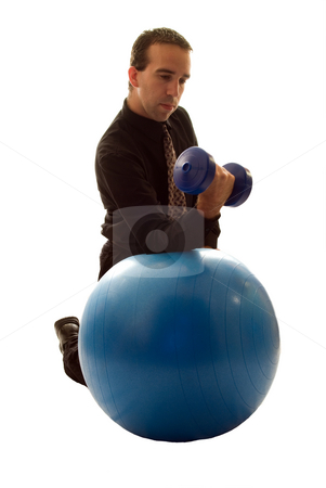 To use this stock image in your creative project, please select the size you need over to the right and click the "Add to Cart" button.
Your downloaded image will come with the Cutcaster watermark removed so don’t worry about the watermark you see on this page. Businessman Relieving Stress stock photo, Businessman using a yoga ball and weights to help relieve stress by Richard Nelson