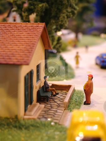 To use this stock image in your creative project, please select the size you need over to the right and click the "Add to Cart" button.
Your downloaded image will come with the Cutcaster watermark removed so don’t worry about the watermark you see on this page. House model stock photo, Reduced little house with two characters by Tilo