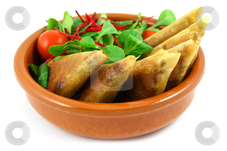 To use this stock image in your creative project, please select the size you need over to the right and click the "Add to Cart" button.
Your downloaded image will come with the Cutcaster watermark removed so don’t worry about the watermark you see on this page. Samosas in a bowl stock photo, Samosas and salad bowl, isolated on white by Tilo