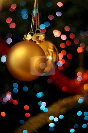 To use this stock image in your creative project, please select the size you need over to the right and click the "Add to Cart" button.
Your downloaded image will come with the Cutcaster watermark removed so don’t worry about the watermark you see on this page. Christmas golden balls stock photo, Christmas golden ball with a light blur creating bokeh in the background by Tilo