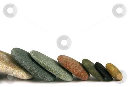 To use this stock image in your creative project, please select the size you need over to the right and click the "Add to Cart" button.
Your downloaded image will come with the Cutcaster watermark removed so don’t worry about the watermark you see on this page. Seven pebbles line stock photo, Seven pebbles in line, over white by Tilo