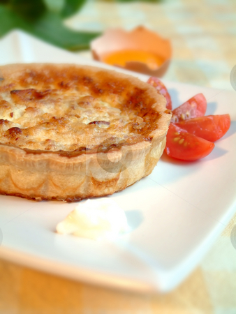 To use this stock image in your creative project, please select the size you need over to the right and click the "Add to Cart" button.
Your downloaded image will come with the Cutcaster watermark removed so don’t worry about the watermark you see on this page. Quiche 2 stock photo, Tasty quiche in a plate by Tilo