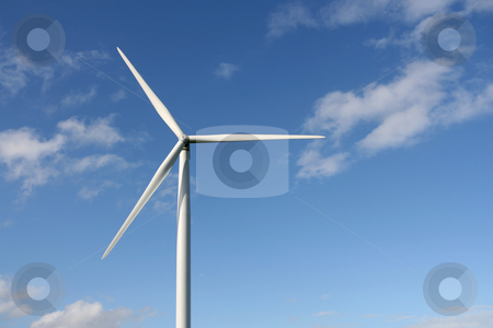 To use this stock image in your creative project, please select the size you need over to the right and click the "Add to Cart" button.
Your downloaded image will come with the Cutcaster watermark removed so don’t worry about the watermark you see on this page. Wind turbine stock photo, Wind turbines in a field over a blue sky. by Tilo