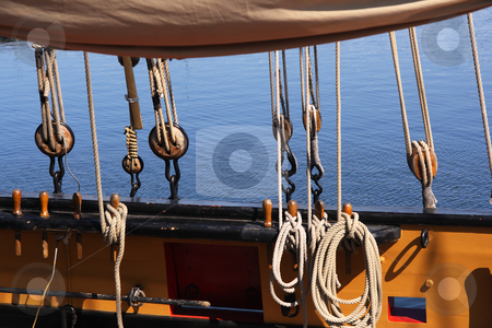 To use this stock image in your creative project, please select the size you need over to the right and click the "Add to Cart" button.
Your downloaded image will come with the Cutcaster watermark removed so don’t worry about the watermark you see on this page. Ship rigging stock photo, Detail of a wooden sailing ship by Tilo
