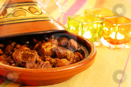 To use this stock image in your creative project, please select the size you need over to the right and click the "Add to Cart" button.
Your downloaded image will come with the Cutcaster watermark removed so don’t worry about the watermark you see on this page. Tagine stock photo, Moroccan Tagine, an oriental cooking from north africa by Tilo