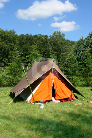 To use this stock image in your creative project, please select the size you need over to the right and click the "Add to Cart" button.
Your downloaded image will come with the Cutcaster watermark removed so don’t worry about the watermark you see on this page. Camping stock photo, Tent in the countryside, in summer by Tilo