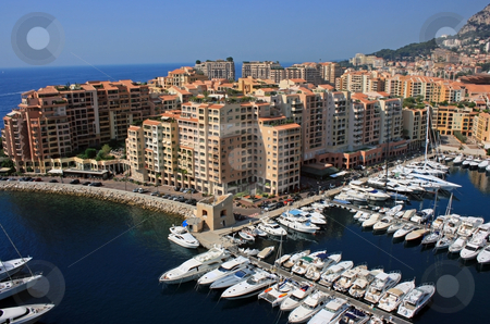 To use this stock image in your creative project, please select the size you need over to the right and click the "Add to Cart" button.
Your downloaded image will come with the Cutcaster watermark removed so don’t worry about the watermark you see on this page. Monaco harbor stock photo, A fragment of Monte Carlo city and its harbour with yachts and motor boats. by Natalia Macheda