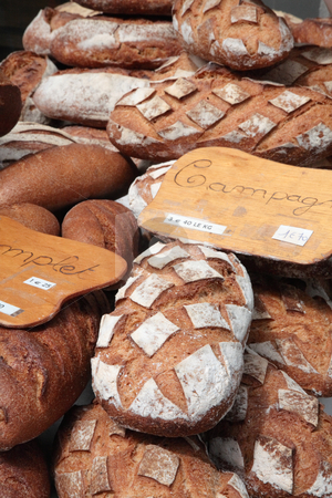 To use this stock image in your creative project, please select the size you need over to the right and click the "Add to Cart" button.
Your downloaded image will come with the Cutcaster watermark removed so don’t worry about the watermark you see on this page. French breads stock photo, French breads in the bakery by Tilo